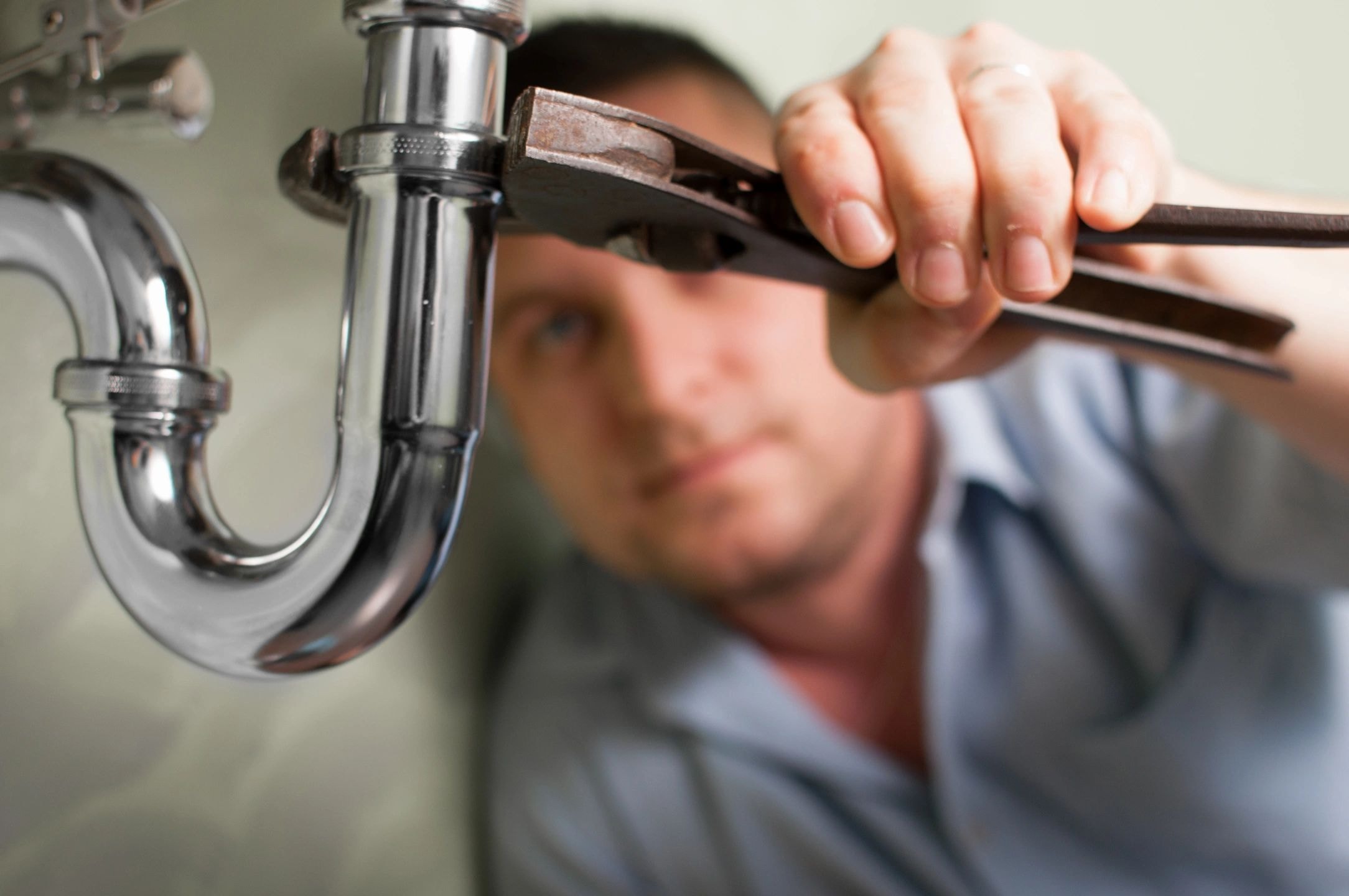 Professional plumber at work